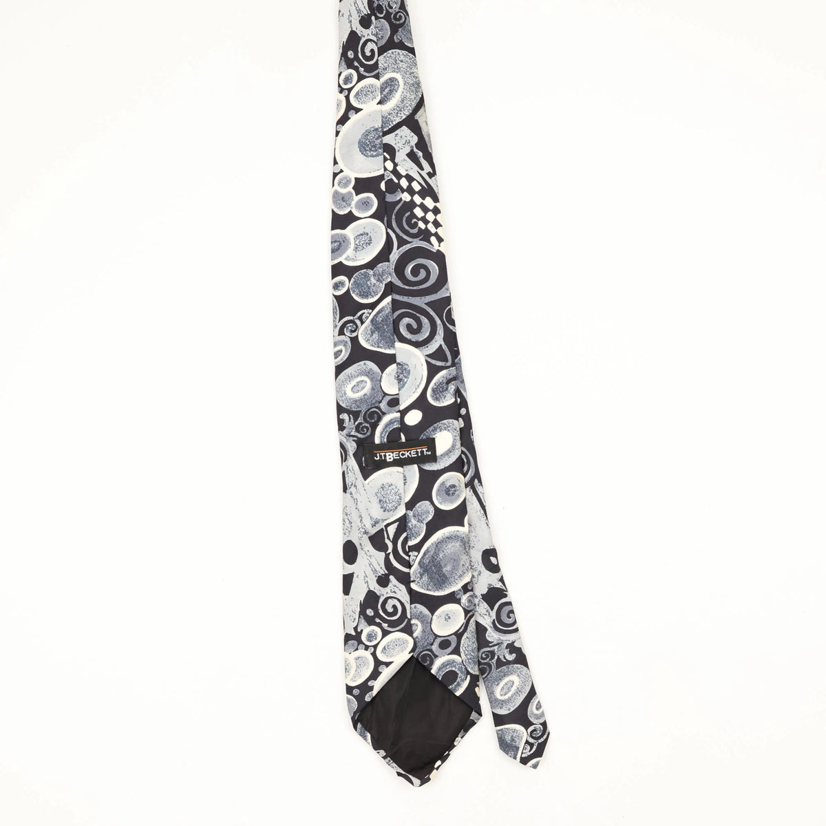 Back Back of Vintage 1990's J.T. Beckett Swirls Abstract Patterned Tie