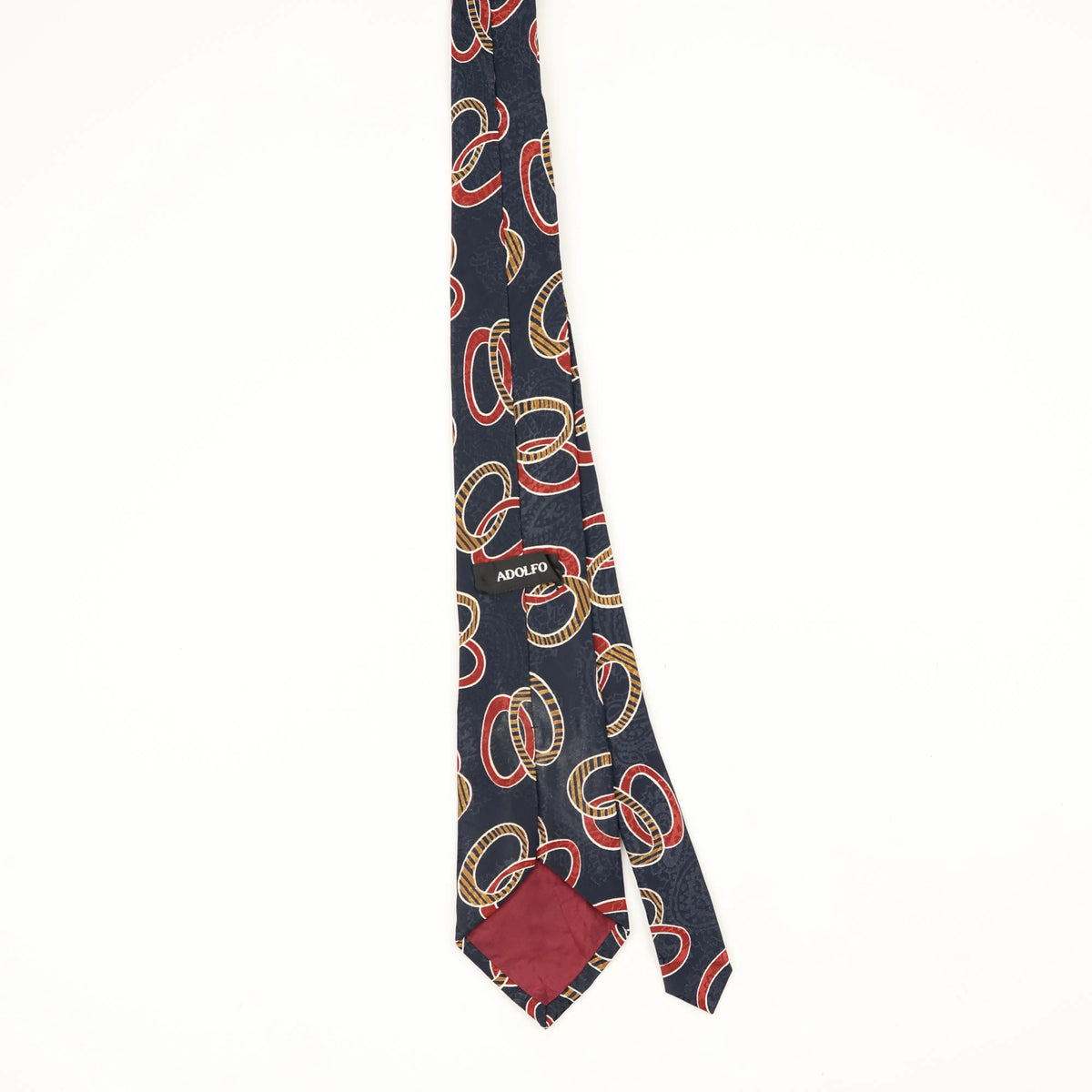 Back Back of Vintage Interlocking Rings Geometric Patterned Tie